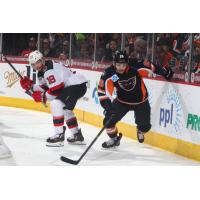 Lehigh Valley Phantoms Forward Phil Varone races to the puck against the Binghamton Devils