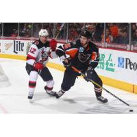 Lehigh Valley Phantoms Forward Mikhail Vorobyev controls the puck against the Binghamton Devils