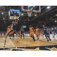 Halifax Hurricanes drive to the basket against the Island Storm