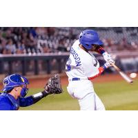 Errol Robinson of the Tulsa Drillers connects on one of his two hits