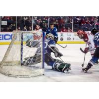 Idaho Steelheads goaltender Philippe Desrosiers holds off the Allen Americans