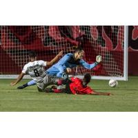 Sacramento Republic and Phoenix Rising FC pileup in front of the net