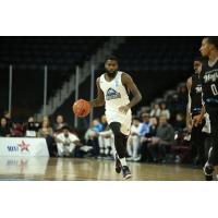 Halifax Hurricanes guard Terry Thomas heads up the court against the Moncton Magic