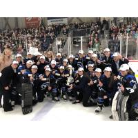 Minnesota Whitecaps celebrate an Isobel Cup win