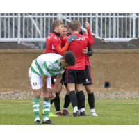 Cavalry FC celebrate a goal against Foothills USL in preseason action