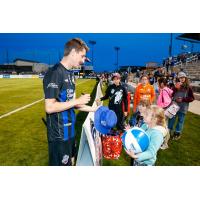 Colorado Springs Switchbacks FC sign autographs for young fans