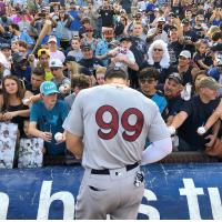 Aaron Judge of the New York Yankees, rehabbing with the Scranton/Wilkes-Barre RailRiders, signs autographs in Durham