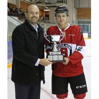Vancouver Giants' Peter Toigo presents the Legends Cup to Tanner Brown