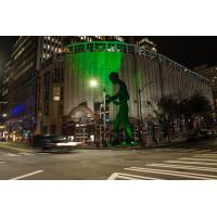 Hammering Man glows Rave Green in support of Seattle Sounders FC