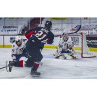 Connor Bowie of the Prince George Cougars takes a shot vs. the Kamloops Blazers
