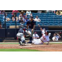 Rome Braves slide home for a run against the Bowling Green Hot Rods