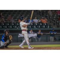 Kansas City Monarchs first baseman Casey Gillaspie launches his 15th home run of the season against the Houston Apollos