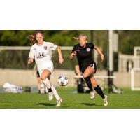 Racing Louisville FC defender Allison Whitfield (right)