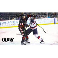 Indy Fuel forward Luc Brown (left) battles the Kalamazoo Wings