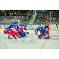 Kitchener Rangers' Cameron Reid and Jackson Parsons in action