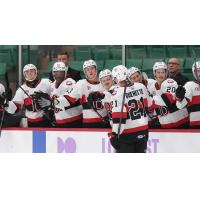 Belleville Senators' Max Guenette congratulated by team