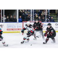 Kelowna Rockets defenceman Caden Price eyes the puck