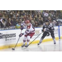 Rapid City Rush's Jarrod Gourley and Idaho Steelheads' Mark Rassell on the ice