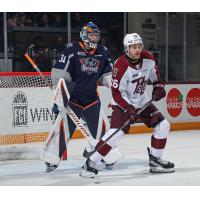 Flint Firebirds' Nathaniel Day and Peterborough Petes' Jax Dubois on game night