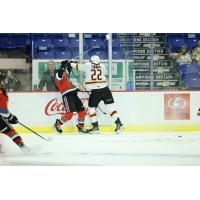 Vancouver Giants' Ty Thorpe battles the Kelowna Rockets