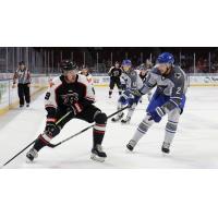 Wichita Thunder defenseman Jeremy Masella (right) vs. the Rapid City Rush