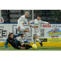 St. Louis Ambush forward William Eskay (lower) vs. the Dallas Sidekicks