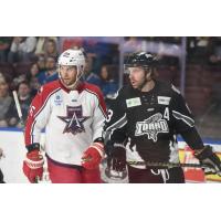 Allen Americans center Spencer Asuchak (left) and Idaho Steelheads defenseman Matt Register