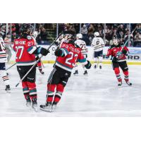 Kelowna Rockets' Jackson DeSouza and Ethan Mittelsteadt on the ice