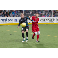 St. Louis Ambush forward Skylar Funk (left) vs. the Kansas City Comets