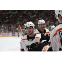 Lehigh Valley Phantoms exchange fist bumps along the bench