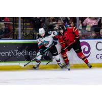 Kelowna Rockets' Hiroki Gojsic versus Prince George Cougars'Hunter Laing