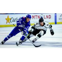 Wichita Thunder forward Peter Bates (left) vs. the Utah Grizzlies