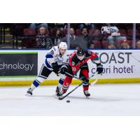 Kelowna Rockets right wing Luke Schelter (right) vs. the Victoria Royals