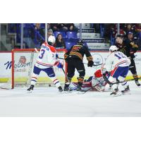 Vancouver Giants defenseman Logen Hammett (center) scores against the Spokane Chiefs