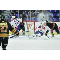 Vancouver Giants defend against the Spokane Chiefs