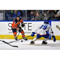 Worcester Railers forward Zach White (left) vs. the Trois-Rivieres Lions