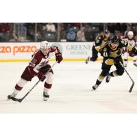 Peterborough Petes' Braydon McCallum and Kingston Frontenacs' Quinton Burns in action