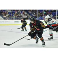 Vancouver Giants' Cameron Schmidt and Kelowna Rockets' Turner McMillen in action