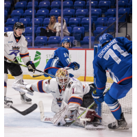 Reading Royals' Anson Thornton battles Trois-Rivières Lions' Chris Ortiz and Justin Ducharme