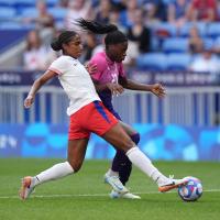 San Diego Wave defender Naomi Girma with Team USA