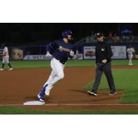 Mike Brosseau of the Syracuse Mets rounds third base