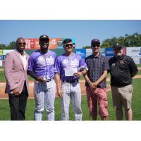 Ramon Santos and Aaron Antonini of the Long Island Ducks accept their awards