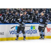 Wenatchee Wild's Chase Bambrick congratulated by teammates