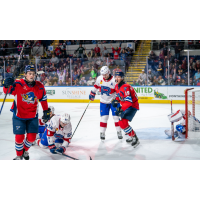 Laval Rocket's William Trudeau and Tyler Wotherspoon and Springfield Thunderbirds' Mackenzie MacEachern on the ice