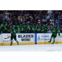 Florida Everblades' Oliver Chau and Andrew Fyten congratulated by team