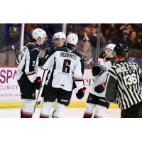 Vancouver Giants gather following a goal