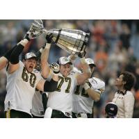 Chris Morris (60) celebrates the Edmonton Eskimos' 2005 Grey Cup win