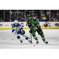 Colorado Eagles' Jere Innala and Texas Stars' Michael Karow in action