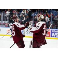 Carson Cameron and goaltender Zach Bowen of the Peterborough Petes