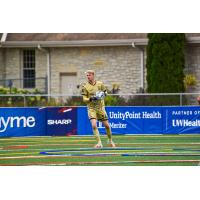 Forward Madison FC goalkeeper Chris Brady